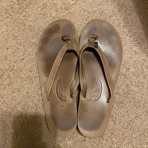 Women’s size large rainbows flip flops